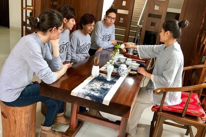 1-day Village Tea Picking, Roasting & Serving Guided Private Tour from Hangzhou - Picking tea leaves in Longwu Tea Village