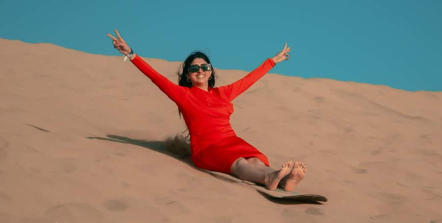 Agadir/Taghazout: Sandboarding & Sunset Tea with Fire Show - Arriving at the dunes and getting ready to ride