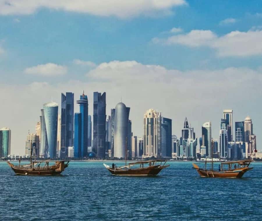 Doha: Dhow Cruise with Pickup, Drop-Off, Tea & Refreshments - Boarding the classic wooden boat