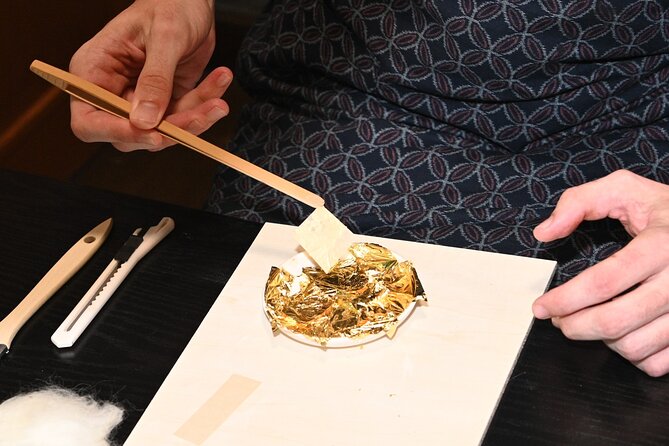 Elegant Tea Ceremony While Wearing Kimono Experience in Kyoto - Decorating a plate with gold leaf