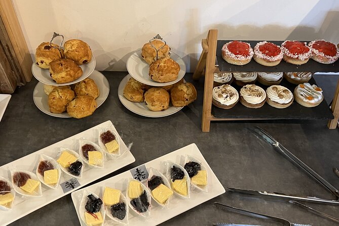 Gin Tasting and Afternoon Tea Delight in Dublin Ireland - Afternoon tea with sandwiches and cakes