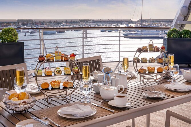 Heritage Tour and Afternoon Tea at Queen Elizabeth 2 Dubai - Walking Through the QE2’s British Design