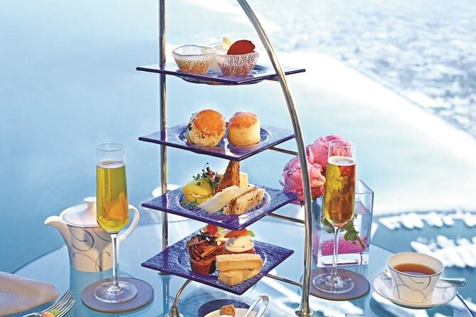 High Tea Experience at Burj Al Arab with Pickup and Drop off - Entering the Burj Al Arab in smart clothes