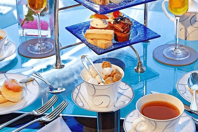 High Tea Experience at Burj Al Arab with Pickup and Drop off - What arrives on the afternoon tea stand