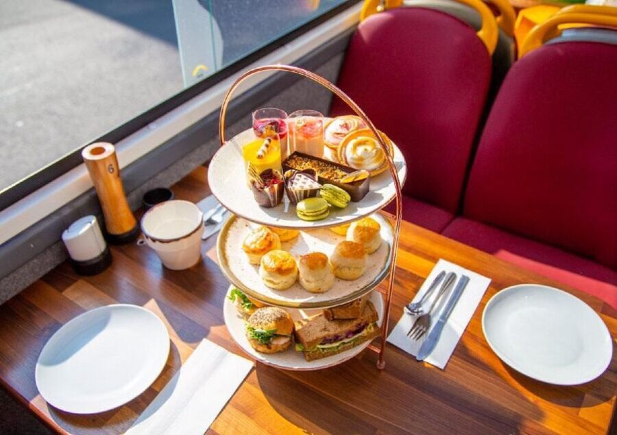 London: Afternoon Tea Bus with a Glass of Prosecco - Sandwiches, scones, cakes, and Prosecco