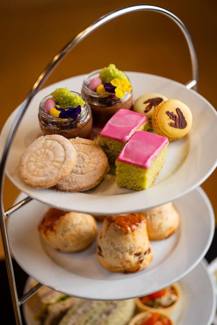 London: Natural History Museum Guided Tour & Afternoon Tea - Fern, the diplodocus, in the new Evolution Gardens