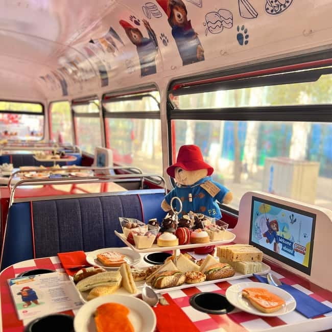 London: Paddington Bear Themed - Afternoon Tea Bus Tour - Paddington and Mrs. Bird keep children involved