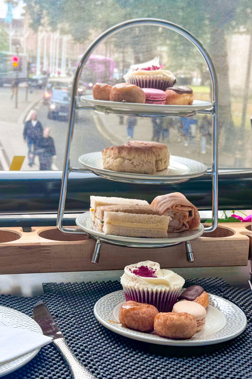 London: Taylor Swift-Inspired Afternoon Tea Bus Tour - Finding the Pink Bus at Golden Tours Stop 1