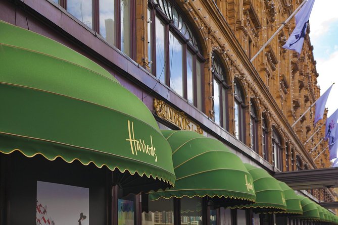 London Vintage Bus Tour with Cream Tea at Harrods - A 45-minute Thames cruise past London landmarks