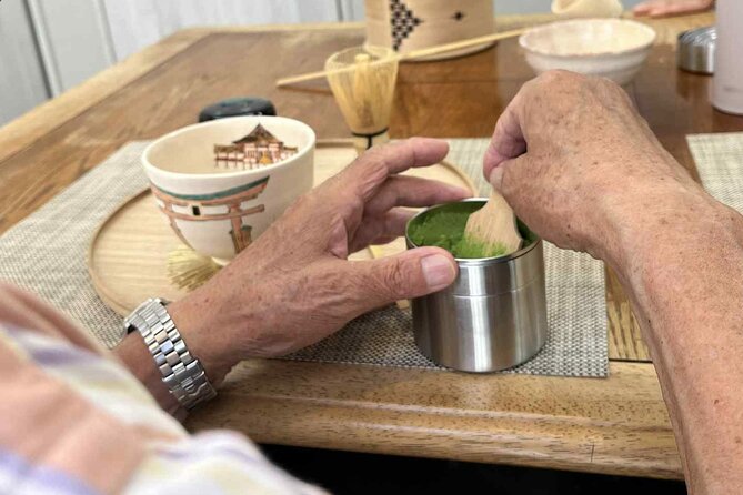 Private Hiroshima Matcha & Wagashi Experience Tour - Whisking Matcha in a Table-and-Chair Setting