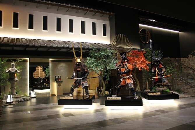Samurai dress-up and shows, plus Tea Ceremony & Calligraphy - Putting on samurai armor at Shinsaibashi ARTY Inn