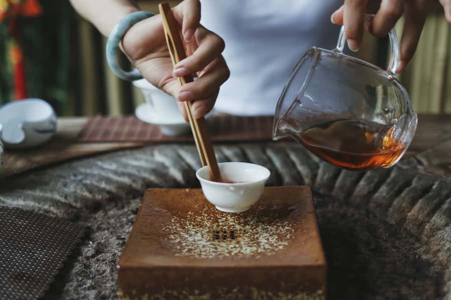 Shanghai 3-Hour Afternoon Tea Tasting and Dessert Tour - A traditional tea ceremony in a Shanghai teahouse